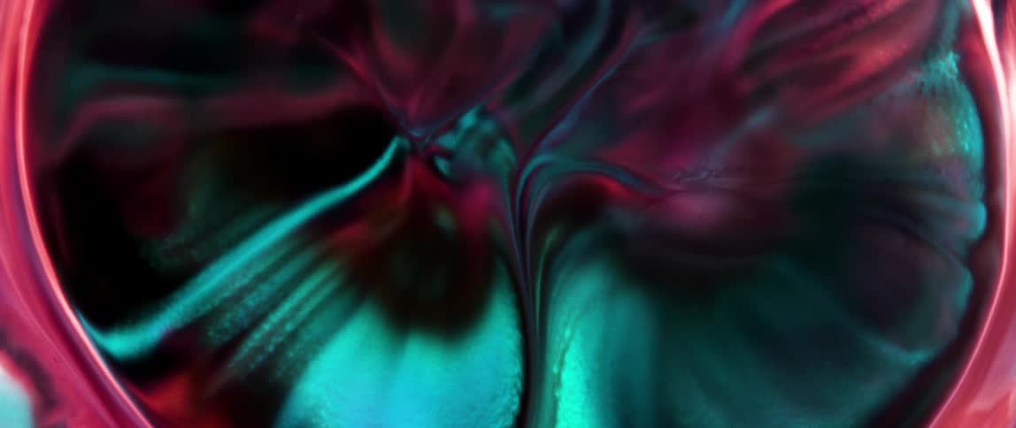 Dense and colorful texture of predominantly pink coloration bubbling in an abstract way