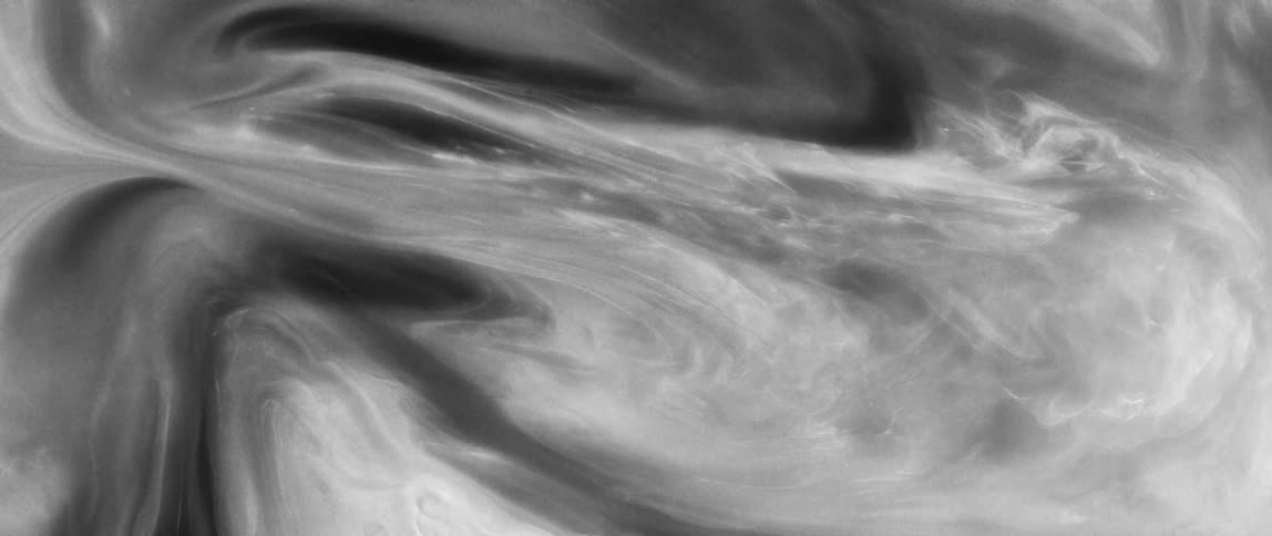 Texture of a dense liquid in extreme closeup in abstract motion