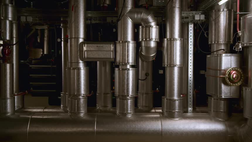 Set of interconnected metal pipes makes up an industrial installation