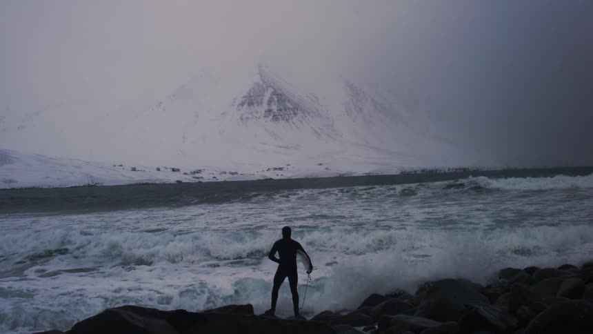 A footage of a person surfing the waves