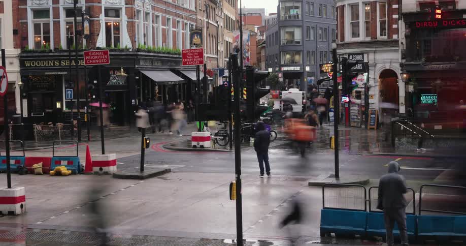 Busy street in a metropolis with vehicle and pedestrian traffic