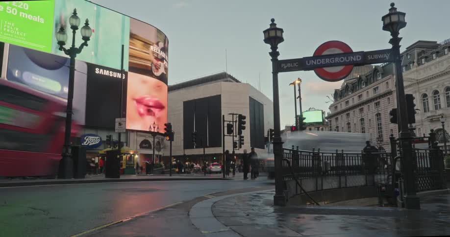 Timelapse of street in a metropolis with vehicle and pedestrian traffic