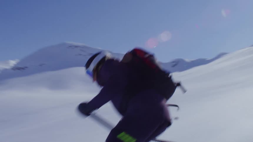 Person skiing on a snowy mountain