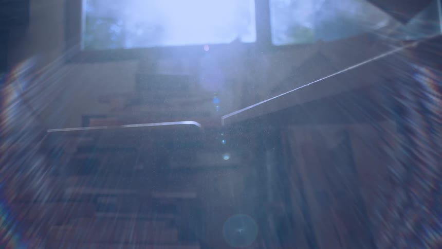 A footage of a sunlight reflecting into the house