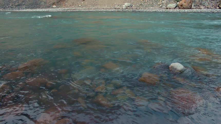 The water flows over the rocks