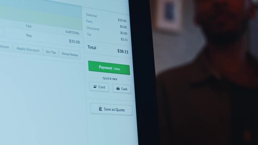 Computer screen displays a payment interface