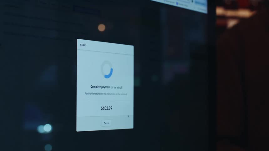 Screen displays a payment process
