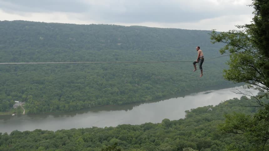 And straddling a high wire alongside a river