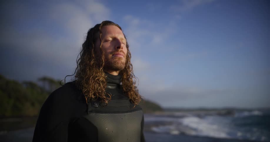 A footage of a person standing by the shore