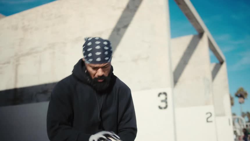 Man with concentrated expression doing goalkeeper training