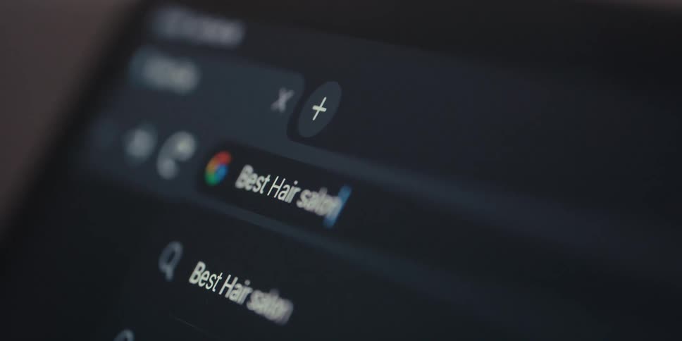 A closeup of a computer screen showing a search query in a search engine