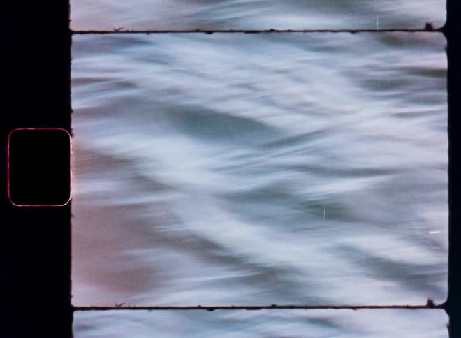 A closeup of the surface of a body of water captured on vintage film