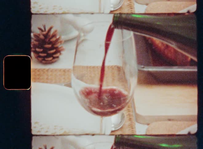 A glass is filled with wine