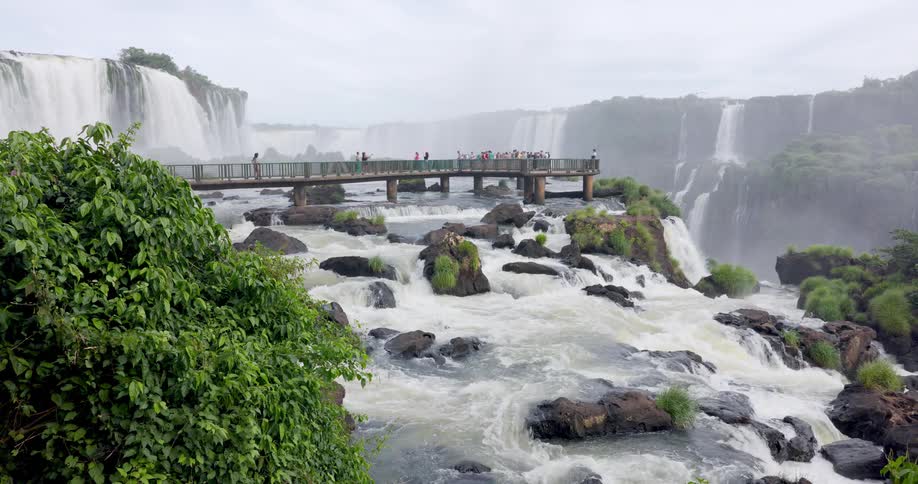 Travelers are visiting niagara falls on a sunny day