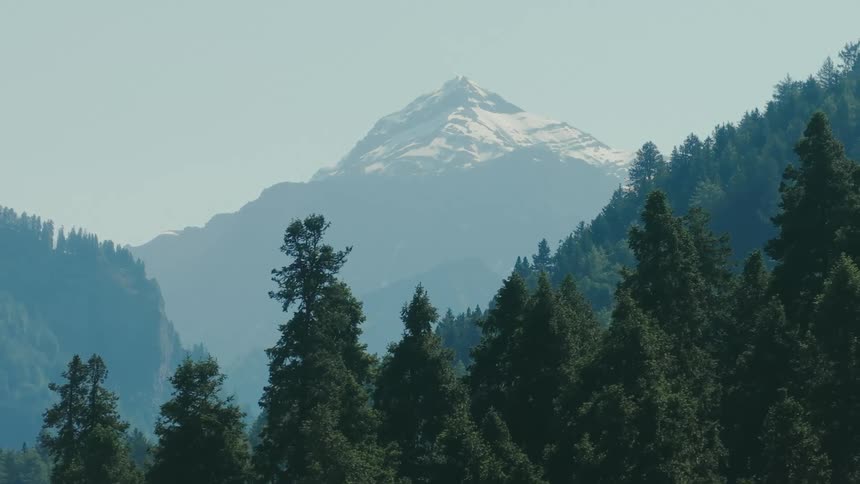 Fog covers the mountains ahead