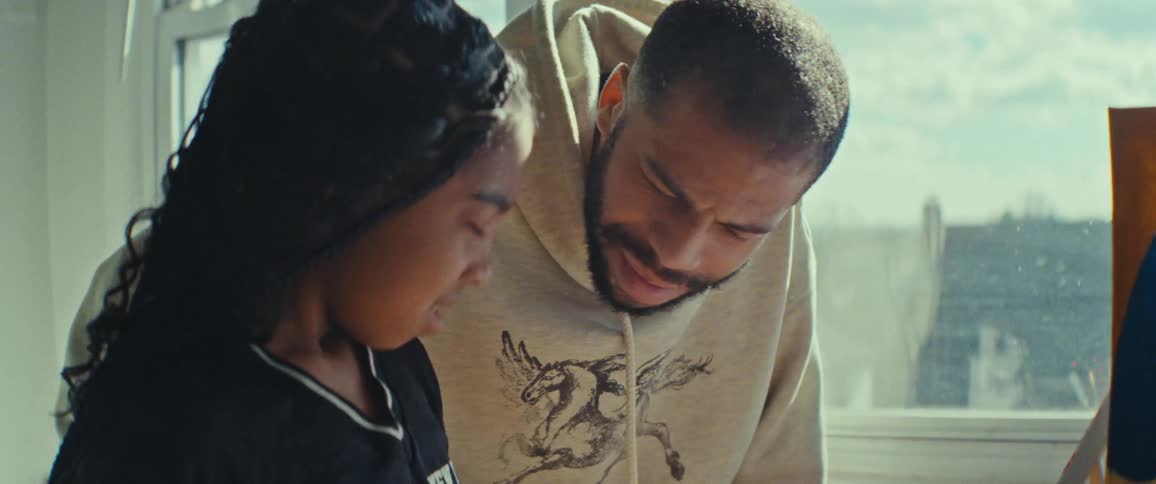 Portrait of father playing with his daughter