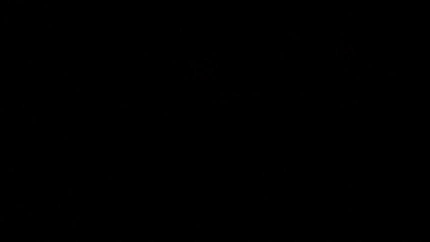 Abstract light reflections against dark background