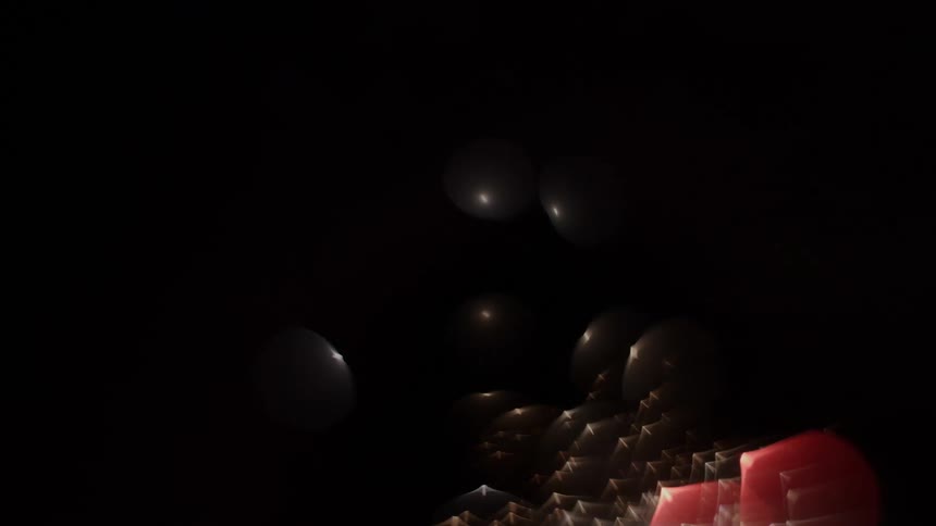 Abstract closeup of fireworks bursting against a dark sky