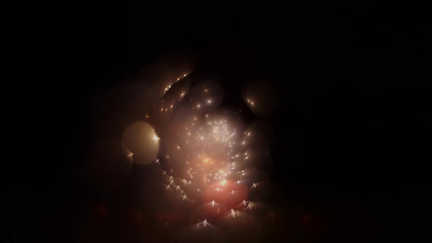 Abstract fireworks against a dark background bursting