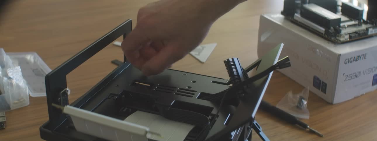 Hand assembling a computer component