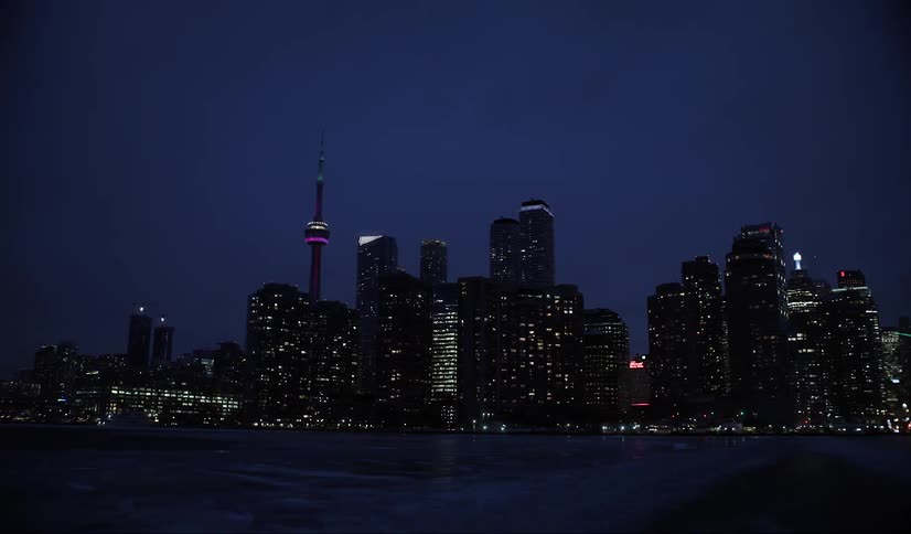 Night panorama of a seaside metropolis