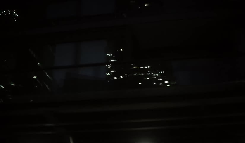 Reflective buildings of a city at night