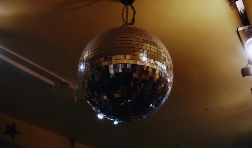Upward view of a glowing disco ball