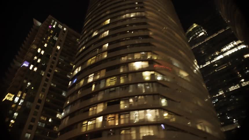 The buildings are bright lit in the big city