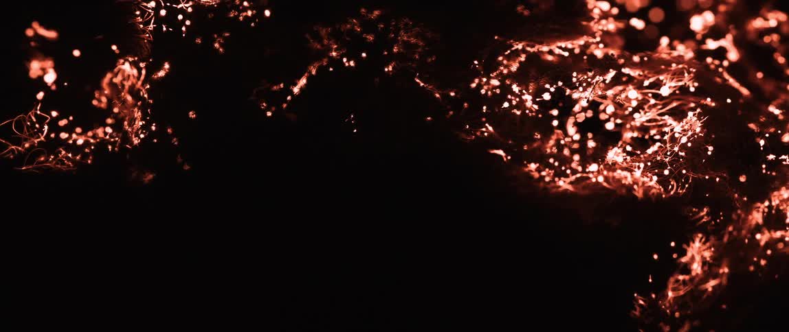 The material is slowly burning in the dark