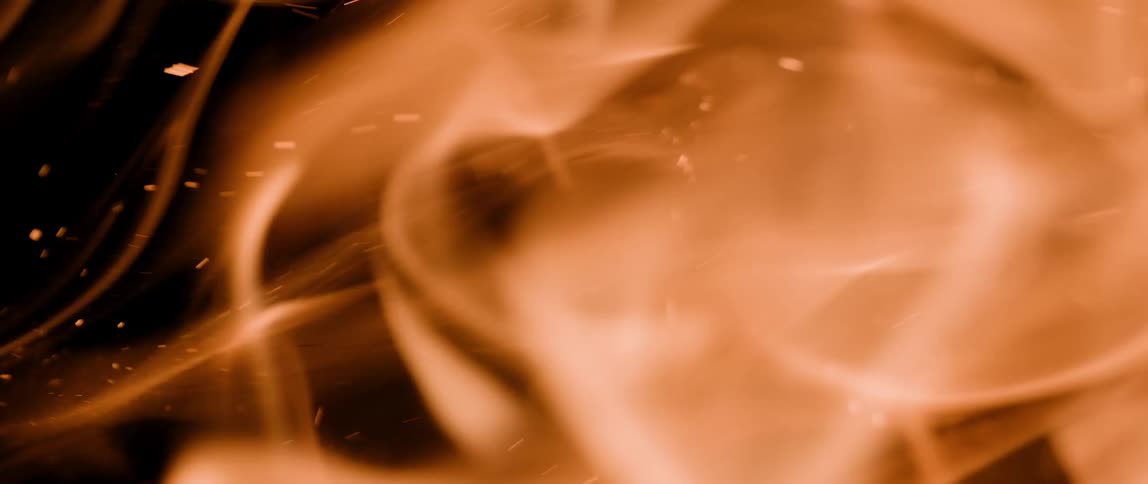 Abstract fire flames against a black background