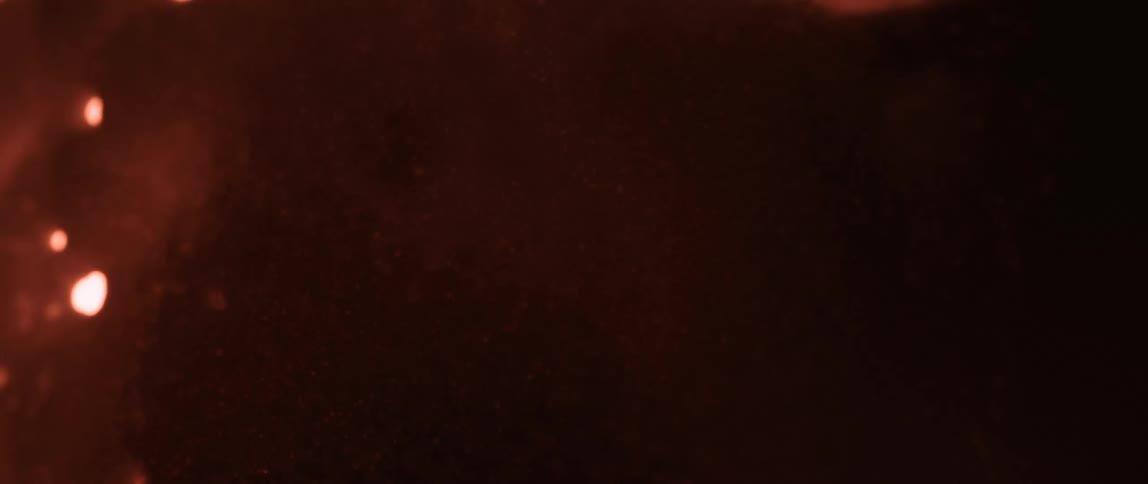 Red dense liquid in abstract motion