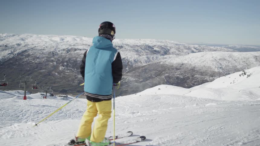 A person skiing past