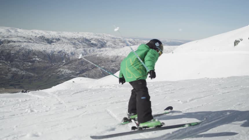 A skier rides on the snow