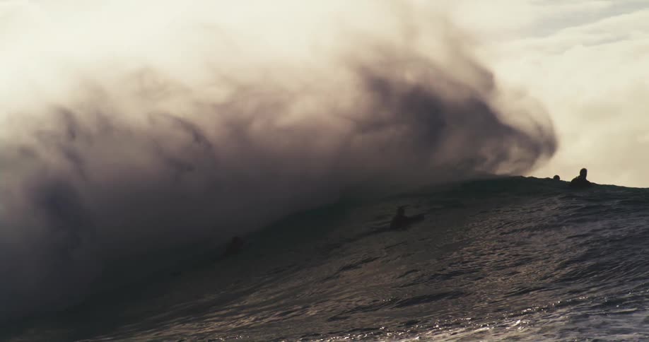 A clip of a people surfing the sea wave