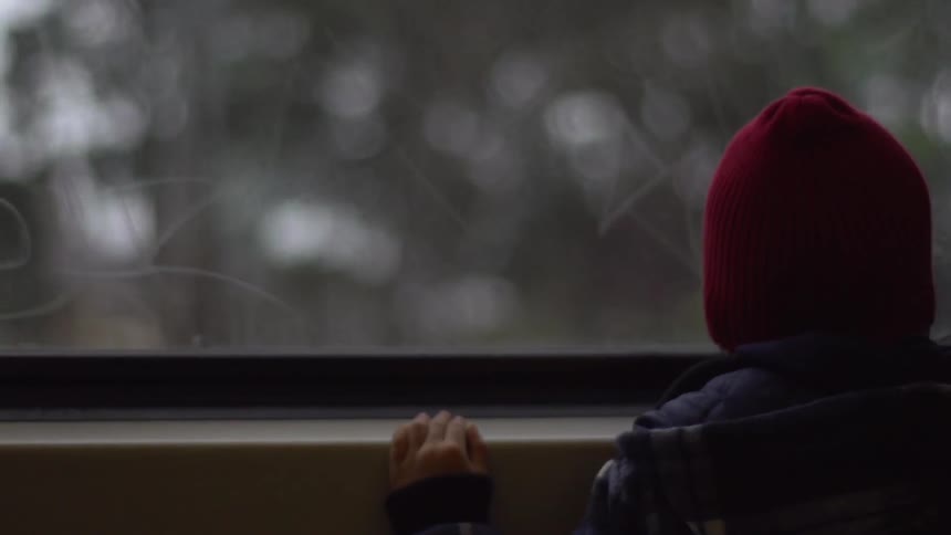 Person riding a passenger train