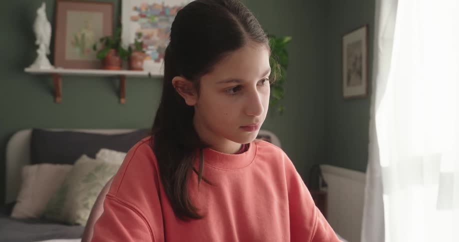 Girl sliding her fingers on a laptop touch mouse