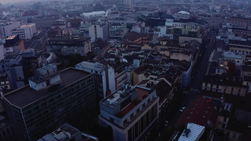 Aerial view of a city with classic and modern buildings in the morning