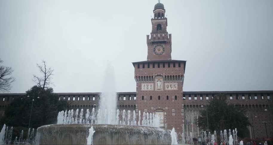 A clip of a water fountain in front of a building