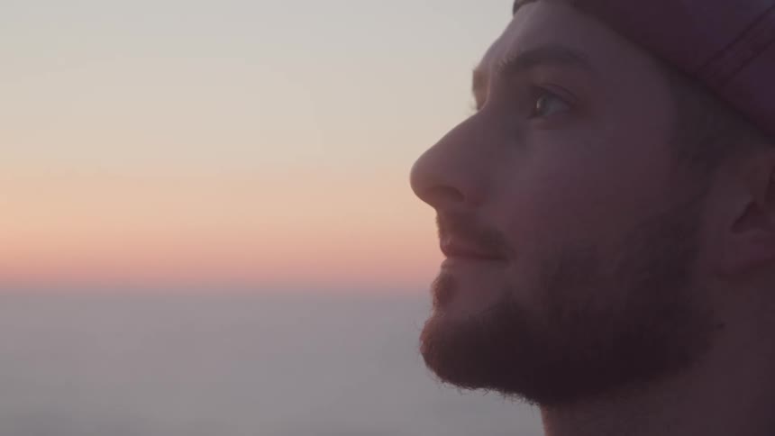 Side portrait of a bearded man