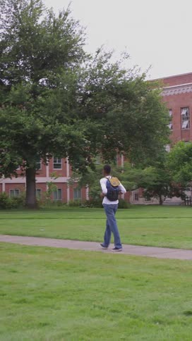 Student walking outside the university