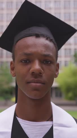 Portrait of a man in graduation cap and gown