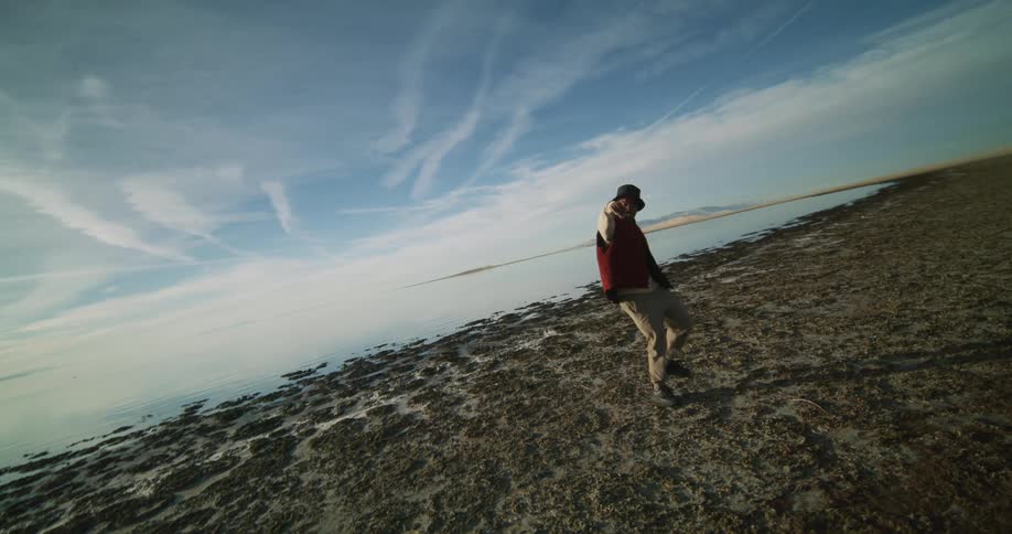 Man dancing by the lake