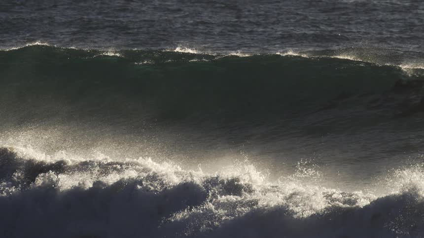 Large waves are crashing in the ocean