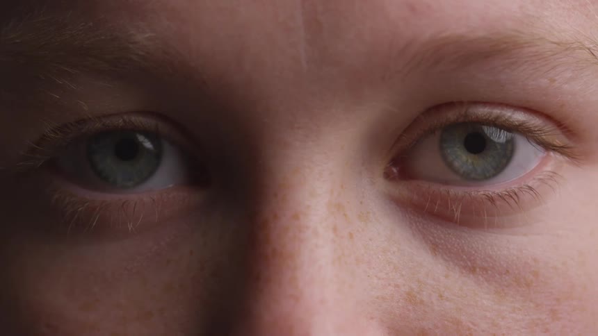 Close up of a persons blue eyes