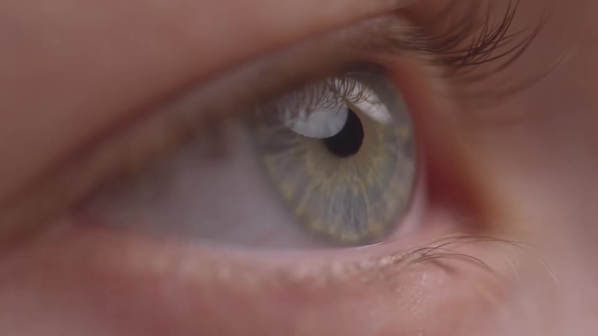 Extreme close up of a persons eye blinking