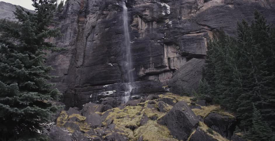 Waterfall splashing down a rocky cliff