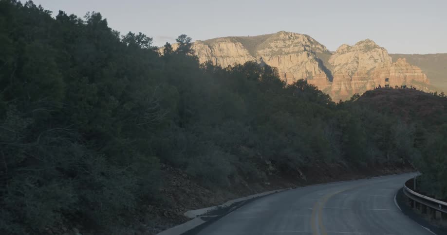 Highway running through forest and mountains