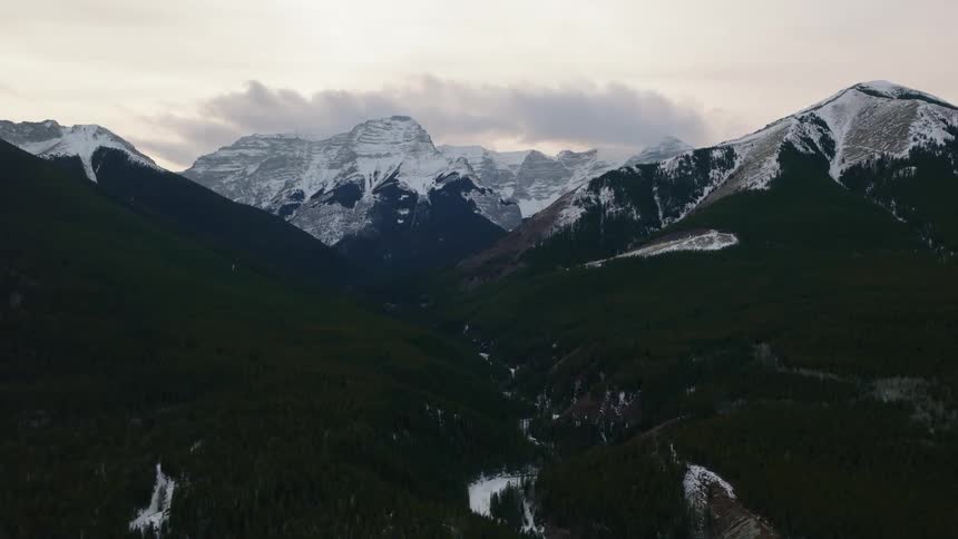 Frozen stream in a valley beneath mount Bogart in Kananaskis Alberta