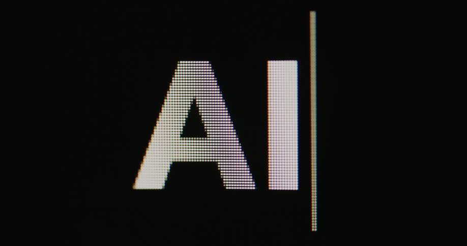 Viewed in extreme closeup the word ai appears in bold white letters on a dark lcd screen each pixel distinctly visible in sharp detail while a small blinking cursor remains at the edge quietly waiting for the next input