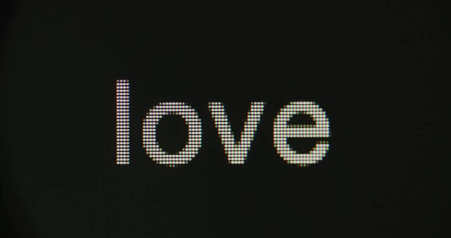 The word love appears on the screen